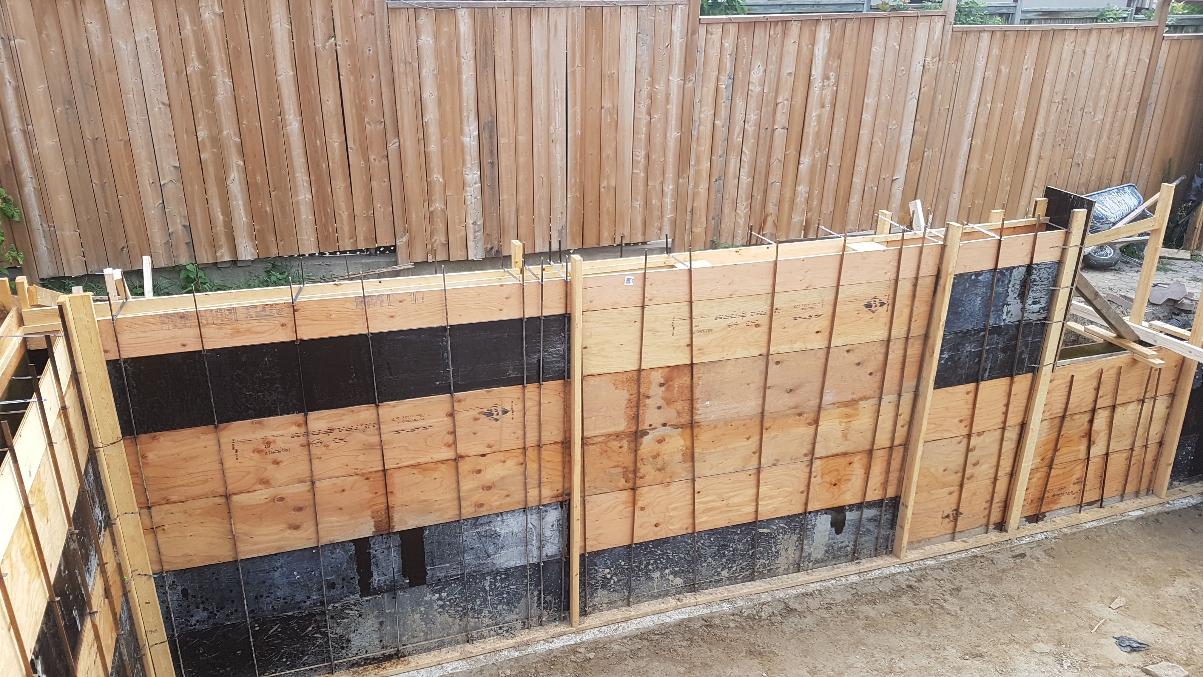 New foundation wall forms along the property
