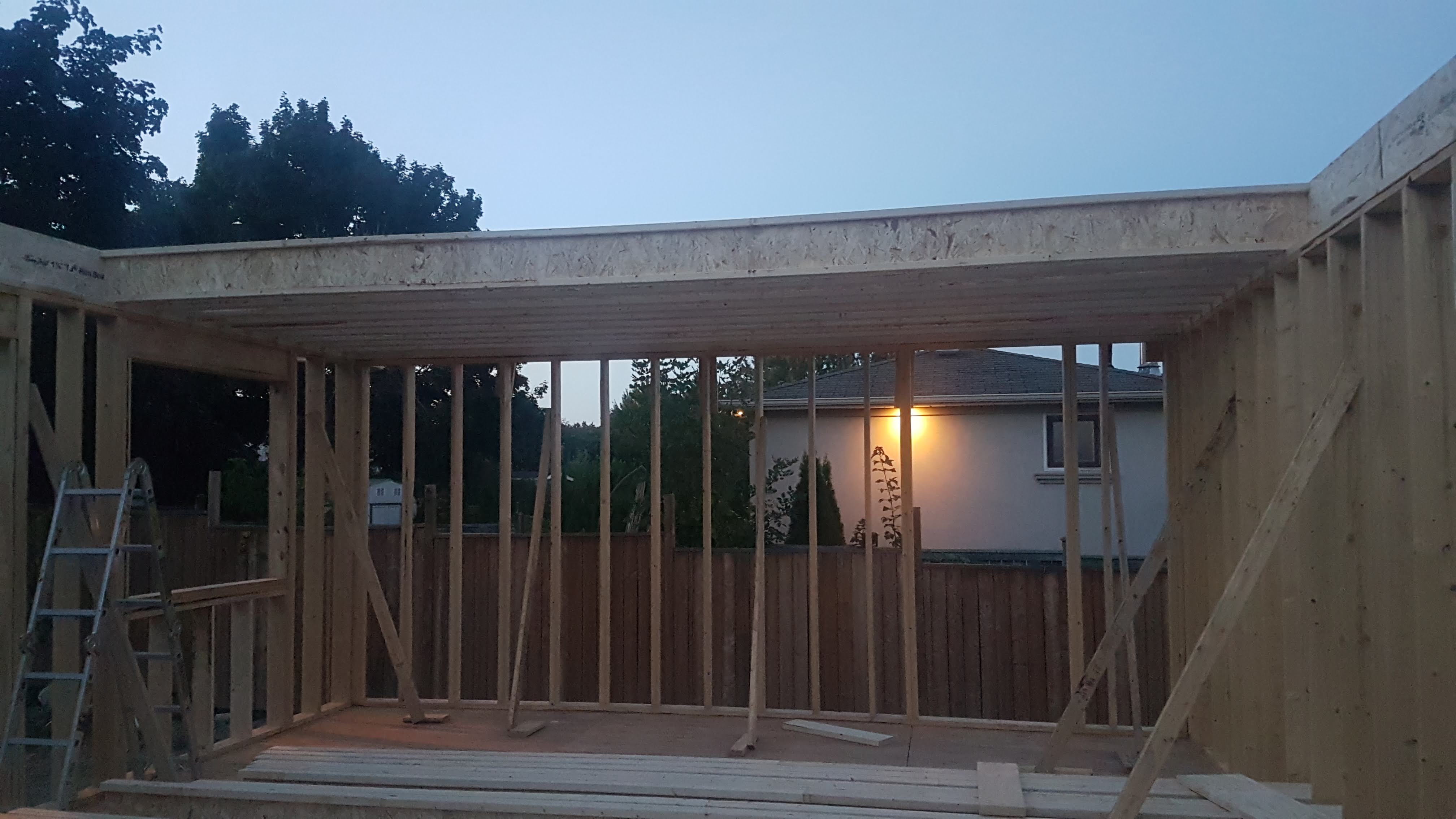 Framed residential walls and large window opening