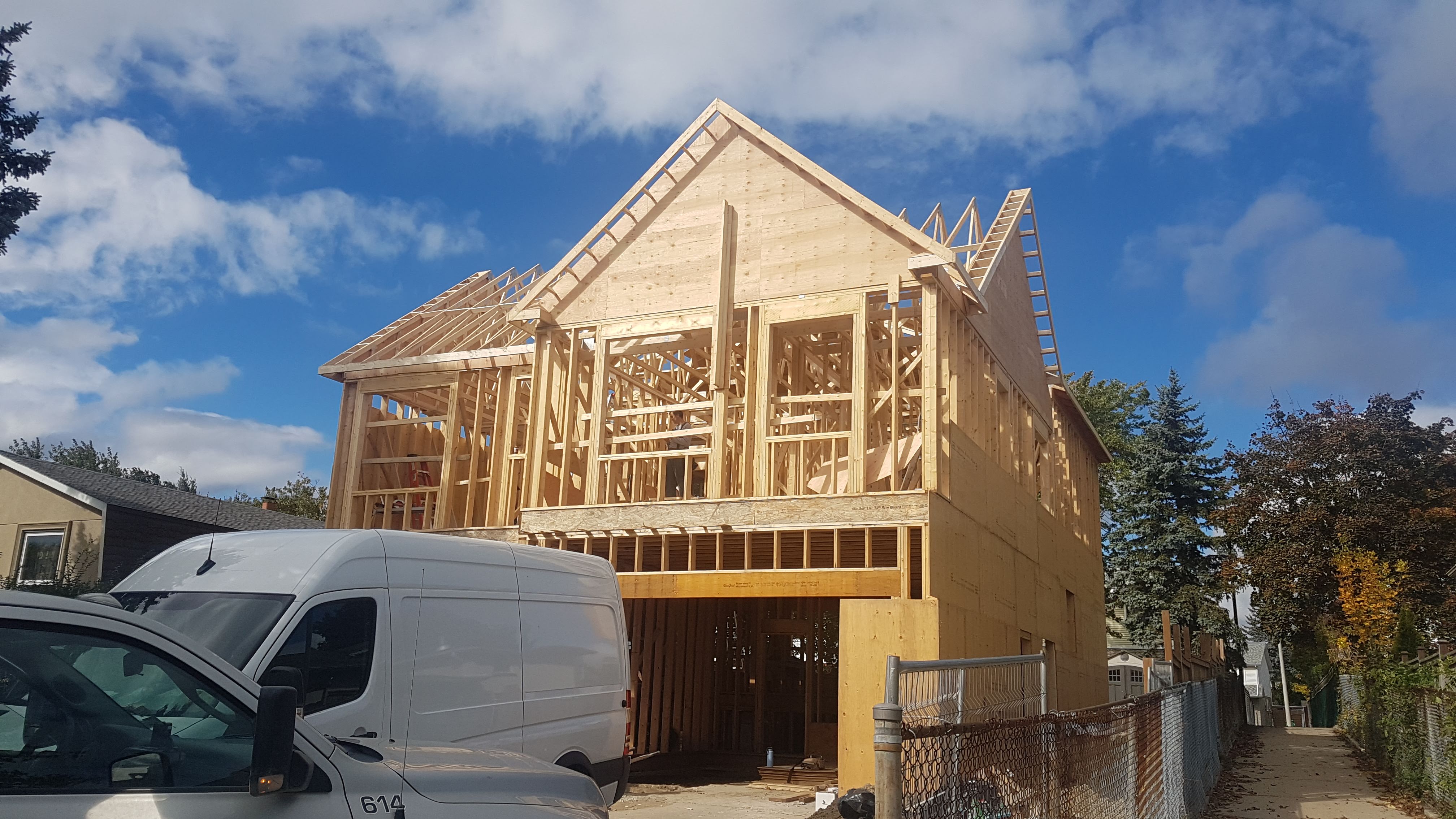 Two-storey house structure with roof framing
