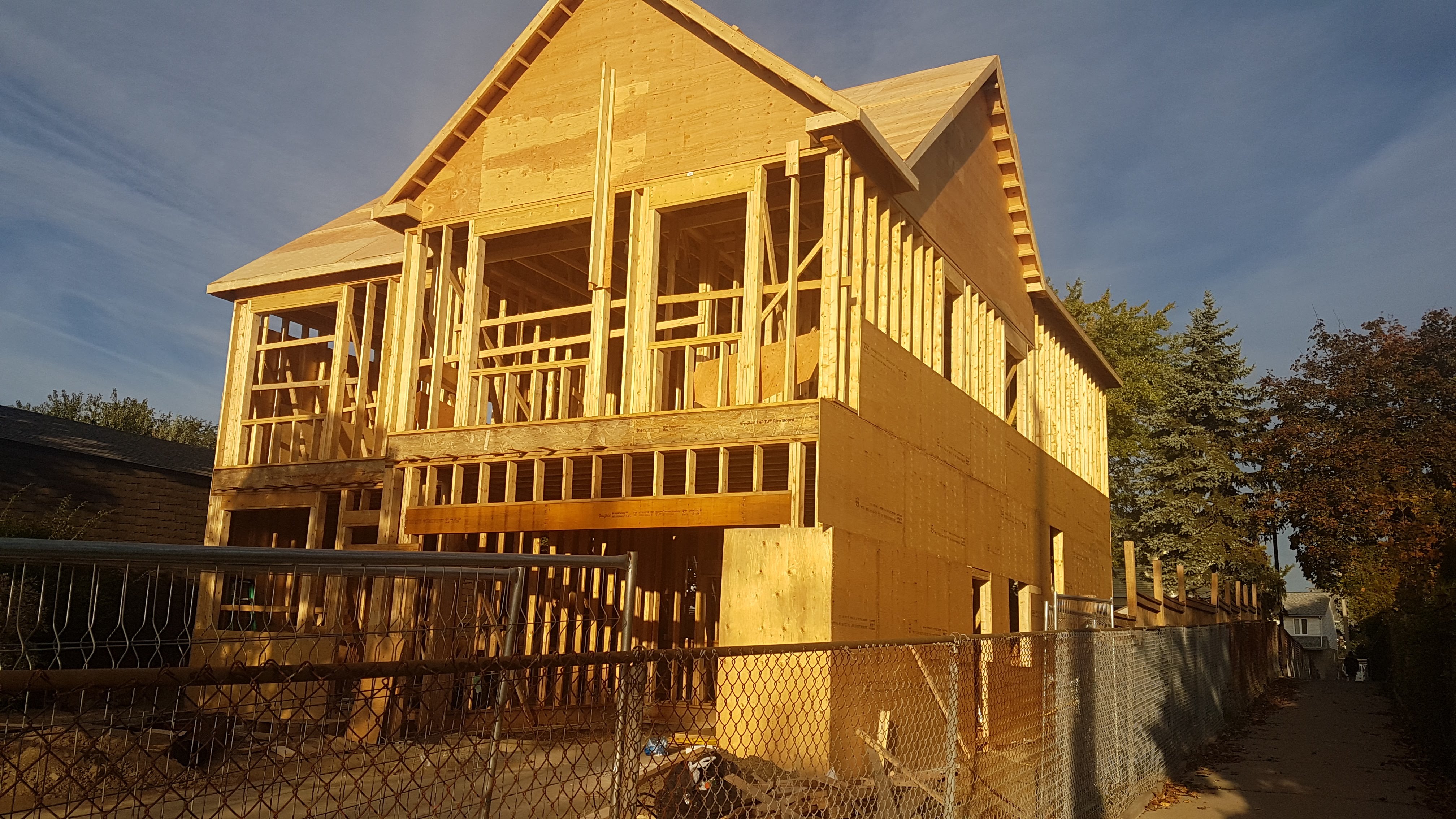 Front view of the framed and sheathed house
